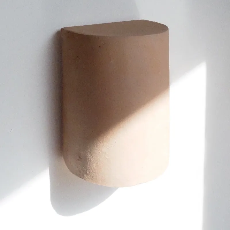 Exterior Organic Raw Ceramic Wall Light | Nudie
